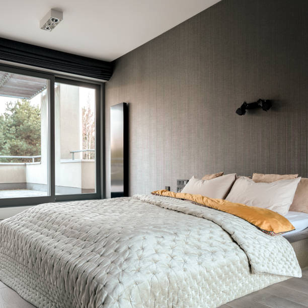 istock Elegant master bedroom with balcony 1278651616