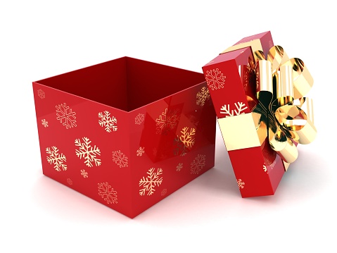 close up top view of christmas gift box with red rolling ribbon and confetti on black background with copy space for black Friday and cyber Monday shopping season and happy new year festival concept