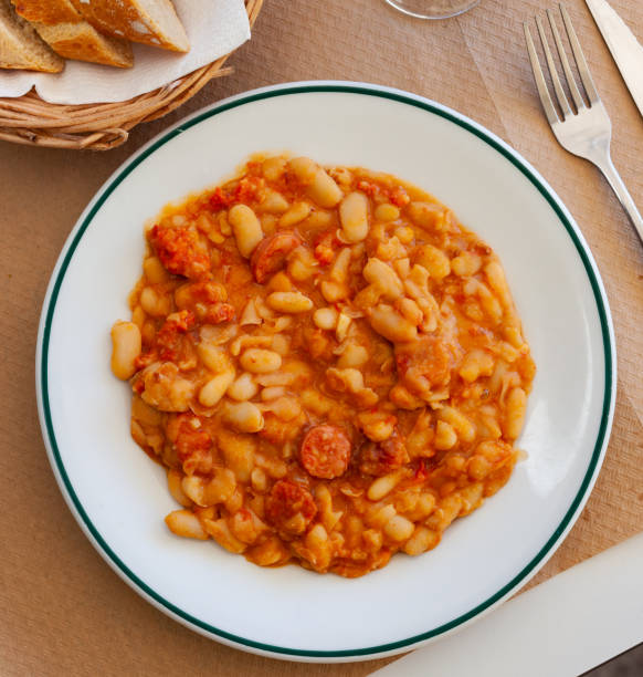 istock Appetizing braised beans with chorizo sausage pieces 1278656987