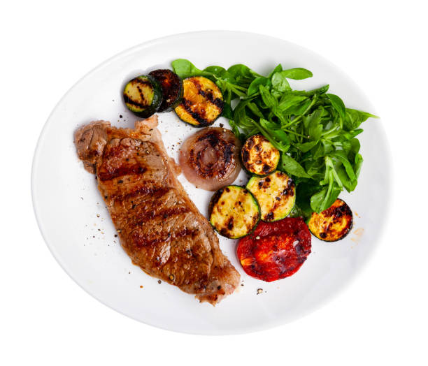 istock Beef with  grilled eggplant, onion, tomatoes and fresh greens 1278657003