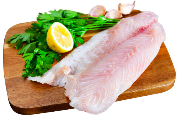 istock Raw perch fish fillet with parsley and lemon 1278657101