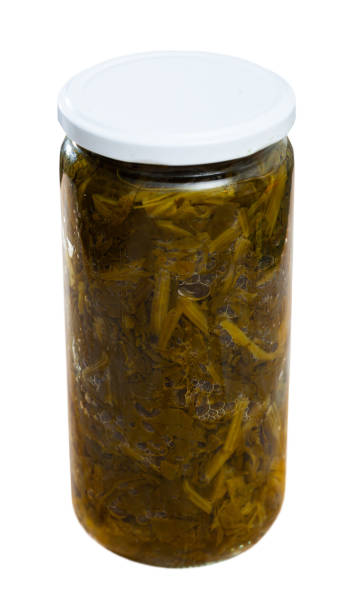 istock Canned green spinach in glass jar 1278657124
