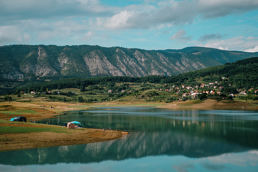 Rama lake in a sunny cloudy day in Bosnia and Herzegovina. Ramsko Jezero, a lake located in Bosnia.