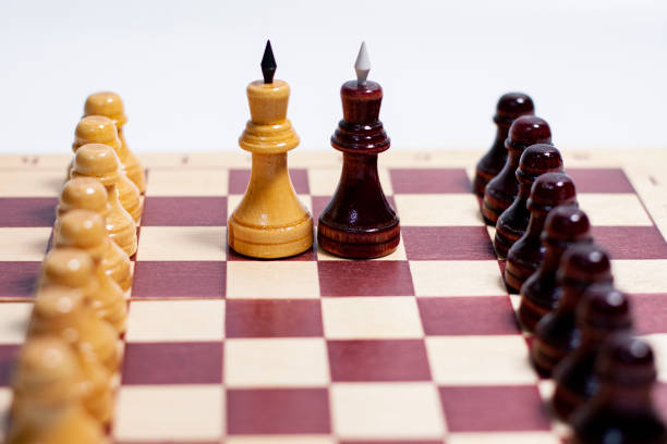 istock Red wood Chessboard. Pawns in their places. 1278657461