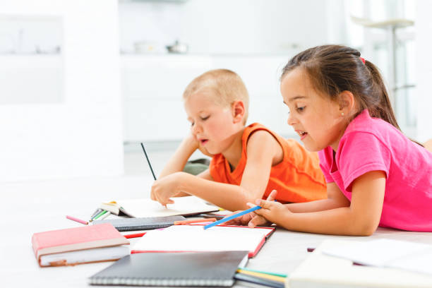 istock Covid-19 Coronavirus and Learning from home, Home school kid concept. Little children study online learning from home with laptop. Quarantine and Social distancing concept. 1278657493