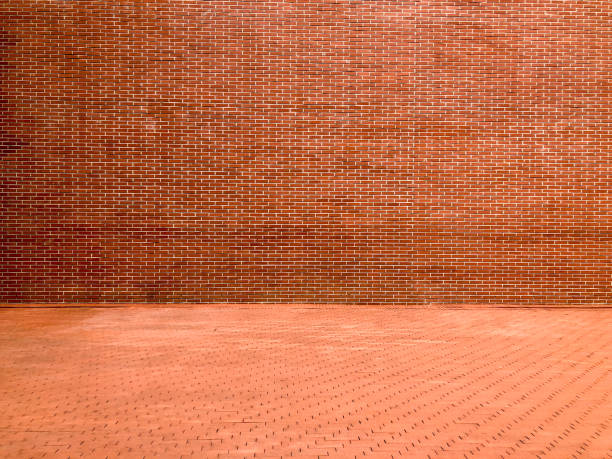 istock Red brick wall and red tiles on the floor 1278657538