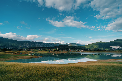 Rama lake in a sunny cloudy day in Bosnia and Herzegovina. Ramsko Jezero, a lake located in Bosnia.