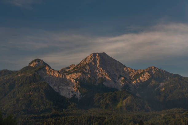 istock Red Mittagskogel hill in summer fresh blue sky morning 1278658537
