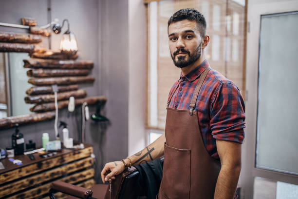 istock Portrait of young handsome barber 1278660648