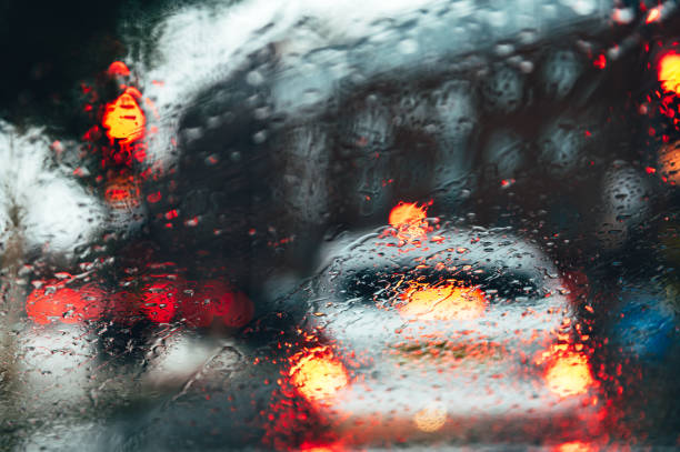 istock Blurred city street during dark rainy day 1278661268