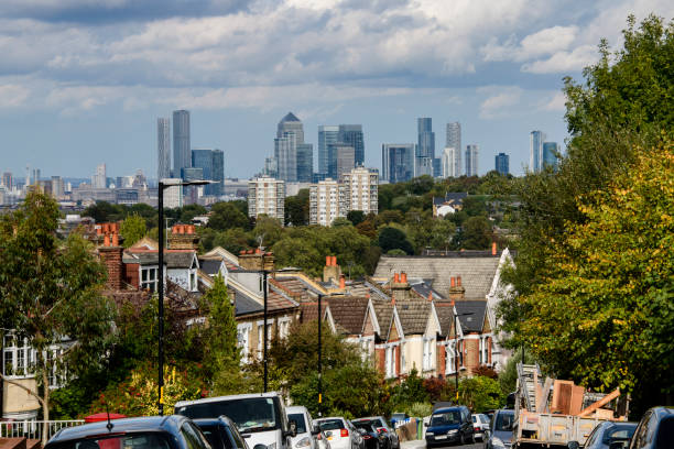 East Dulwich urban residential street and Canary Wharf docklands in distance