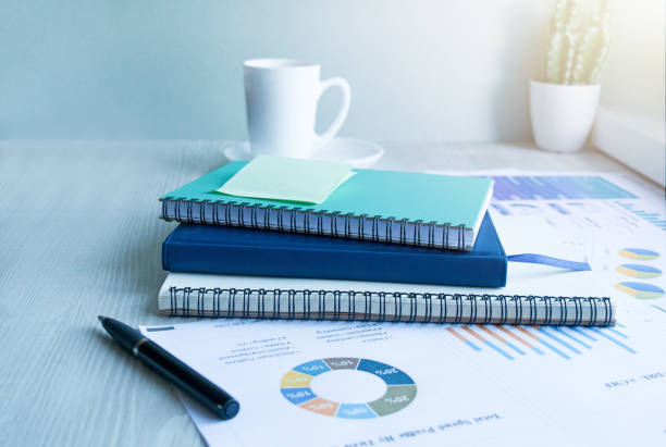 istock Business documents, business charts on the office table as a business workplace concept. Soft light. 1278666179