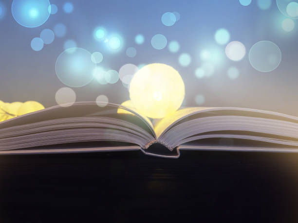 istock Open book on blue background, open pages as a concept of new knowledge, online self-study 1278667639