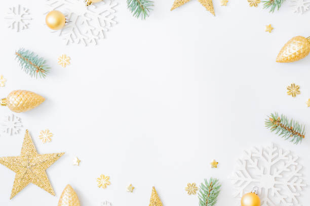 istock Flat lay frame with fir branches, christmas baubles decoration and snowflakes on a white background 1278667720