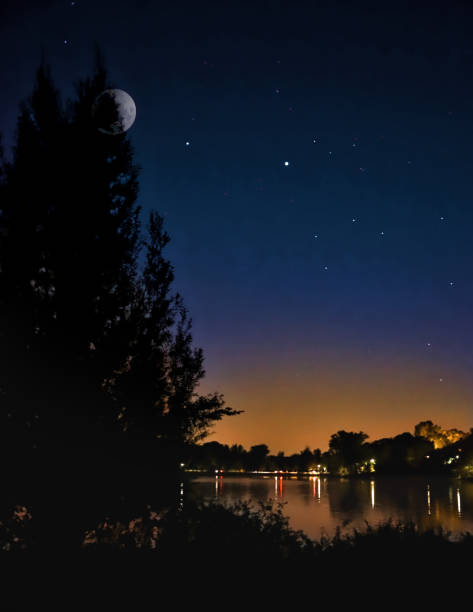 istock Night sky with full moon, Saturn and Jupiter 1278668741