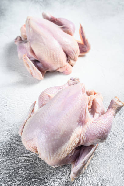 istock Organic farm raw whole chicken. White background. Top view 1278668845