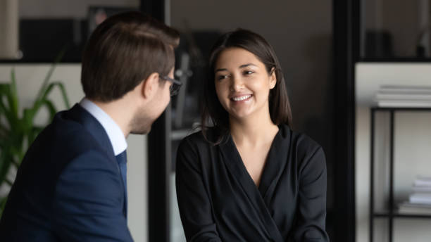 istock Smiling multiracial business people communicating in office. 1278673136