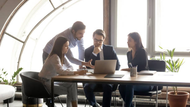 istock Pensive diverse business people discussing project presentation. 1278673170