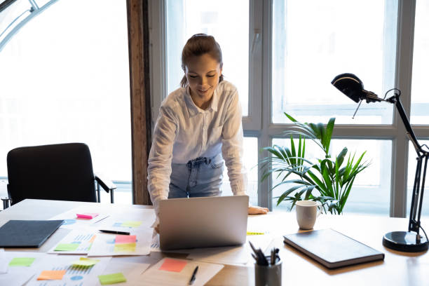 istock Smiling young european appearance female worker planning current issues. 1278673229