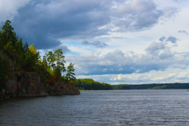 istock A Lake with green Islands and blue Sky with Clouds. 1278673248