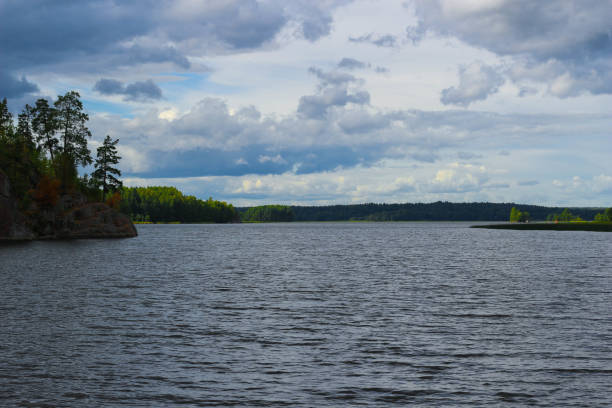 istock A Lake with green Islands and blue Sky with Clouds. 1278673389