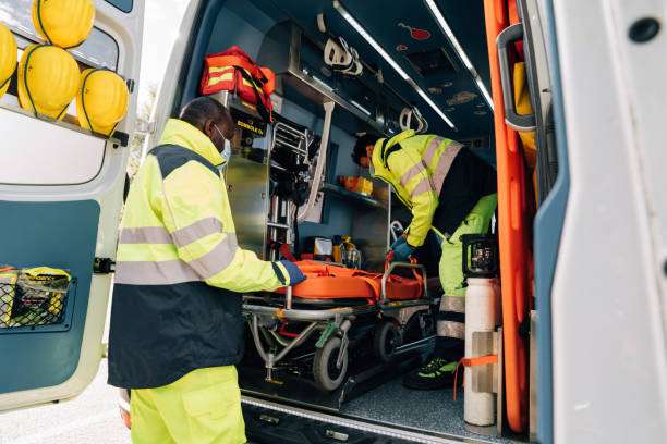 istock Two paramedics with a stretcher near an ambulance 1278675523
