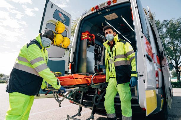 istock Two paramedics with a stretcher near an ambulance 1278675531