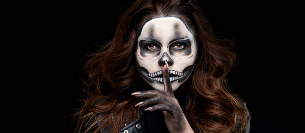 istock Woman with halloween skull makeup 1278679770