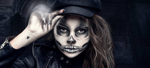 istock Woman with halloween skull makeup 1278679907