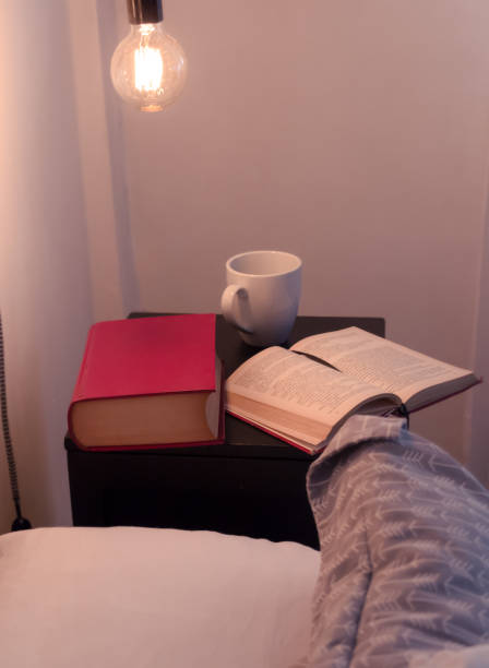 istock Make yourself comfort have a tea and read a book before go to sleep 1278680081