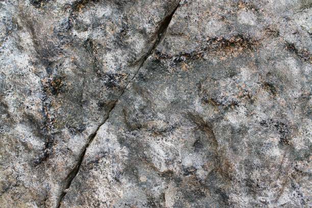 istock Close up view at a granite and stone wall texture in a high resolution. 1278685864