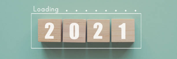 istock Wooden blocks in loading bar for 2021 Goal planning business concept 1278686576