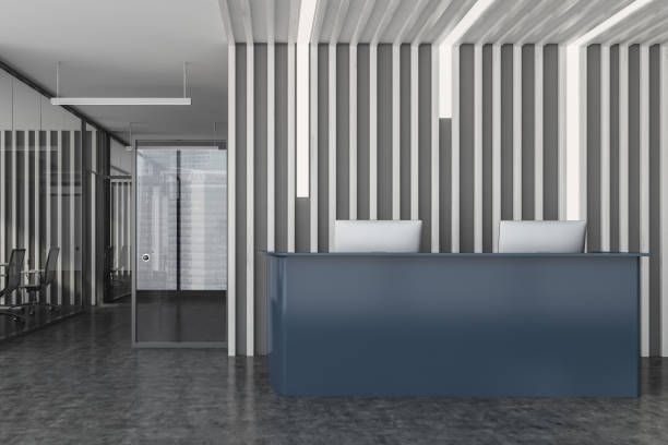 istock Grey reception desk in wooden office 1278688227