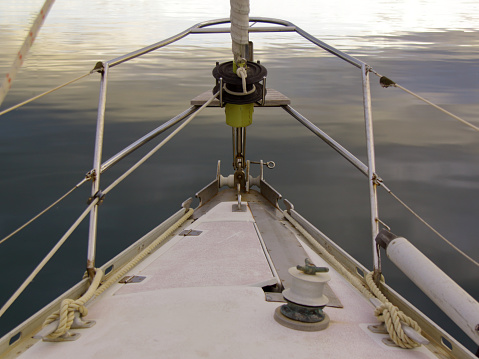 LaSpezia, Italy - summer 2020: Closeup photo of the bow of a sailboat moored at the harbour