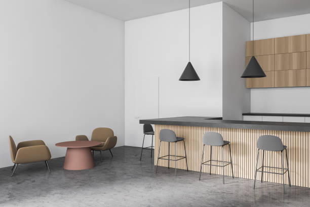 istock Modern white and wooden cafe bar corner with armchairs 1278692356