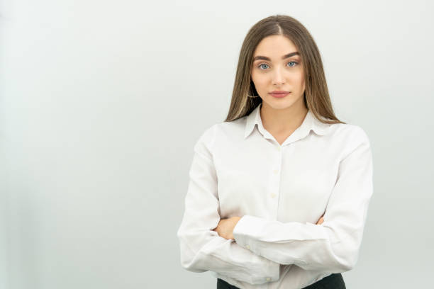 istock Smiling blond business woman on white background 1278693004