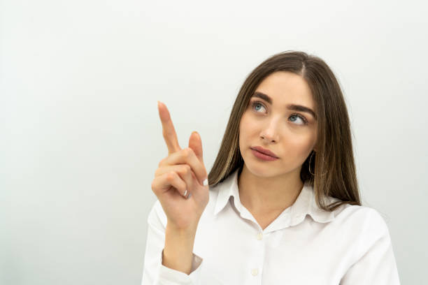 istock surprised blond business woman on white background 1278693022