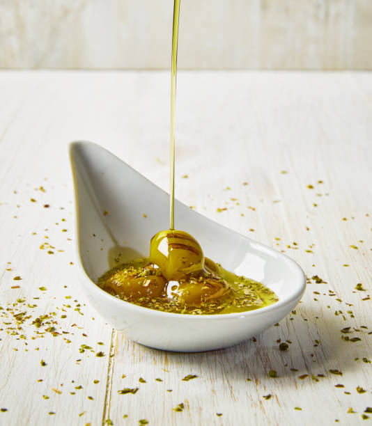 istock Green Olives With Olive Oil 1278695339