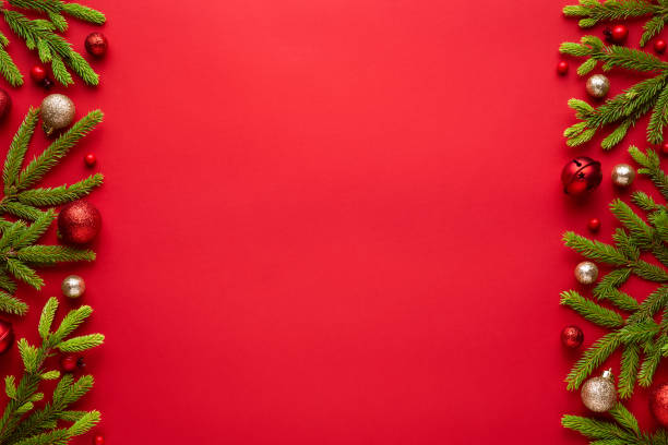 istock Red christmas background with fir branches and decorations 1278695669
