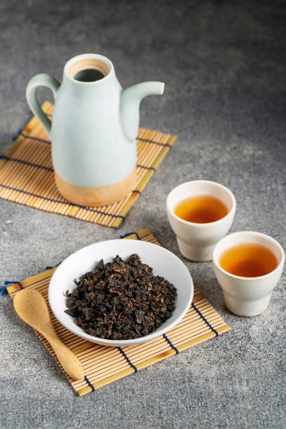 istock Hot tea in glass teapot and cup with steam 1278700009