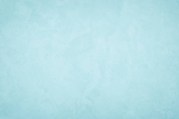 istock Pastel Blue and White concrete stone texture for background in summer wallpaper. Cement and sand wall of tone vintage. Concrete abstract wall of light cyan color, cement texture mint green for design. 1278717596