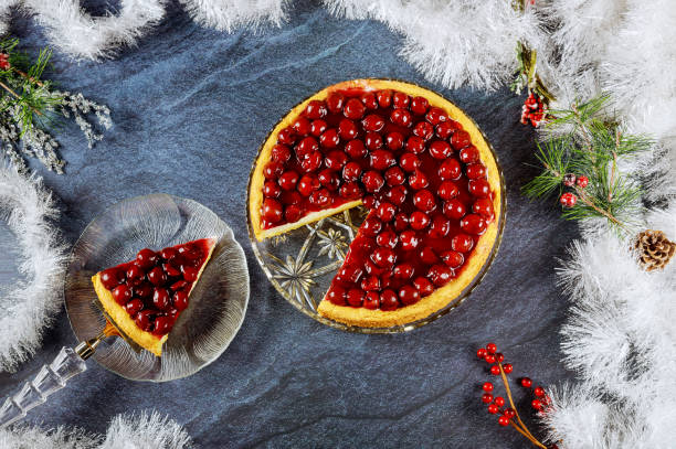 istock Cherry cheesecake with berries on the top with Christmas decoration. 1278720289