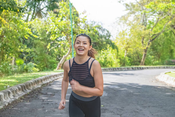 istock Chinese female runner jogging 1278720308