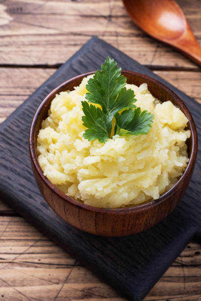 istock Homemade cream mashed potatoes in a dish with parsley. copy space 1278725188