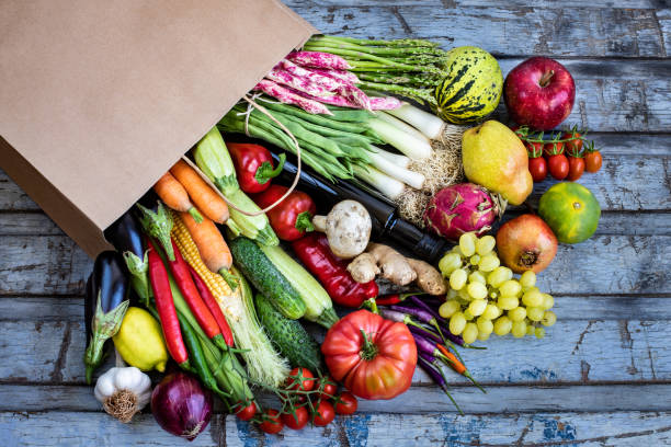 istock Fresh vegetables in the paper bag. 1278727838