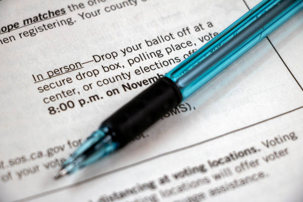 istock In Person Ballot Return Info with Pen 1278728890