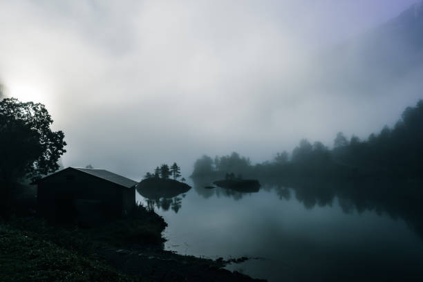 istock lake house in fog 1278731341