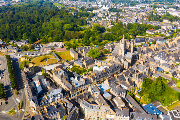 Flight over the city Guingamp and Basilica of Our Lady of Merciful on summer day Flight over the city Guingamp and Basilica of Our Lady of Merciful on summer day. France guingamp brittany stock pictures, royalty-free photos & images