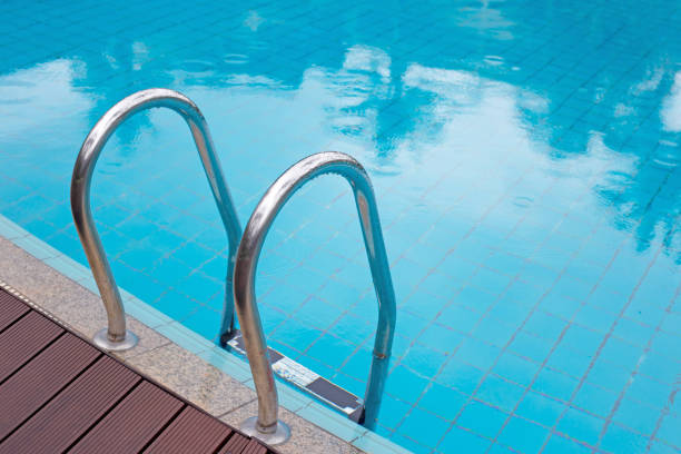 istock Outdoor swimming pool with stair 1278733088