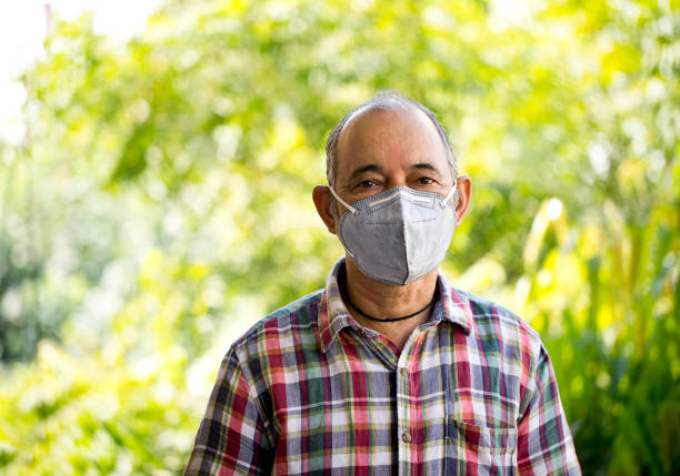 istock Old senior wears a mask to protect against viruses 1278734827
